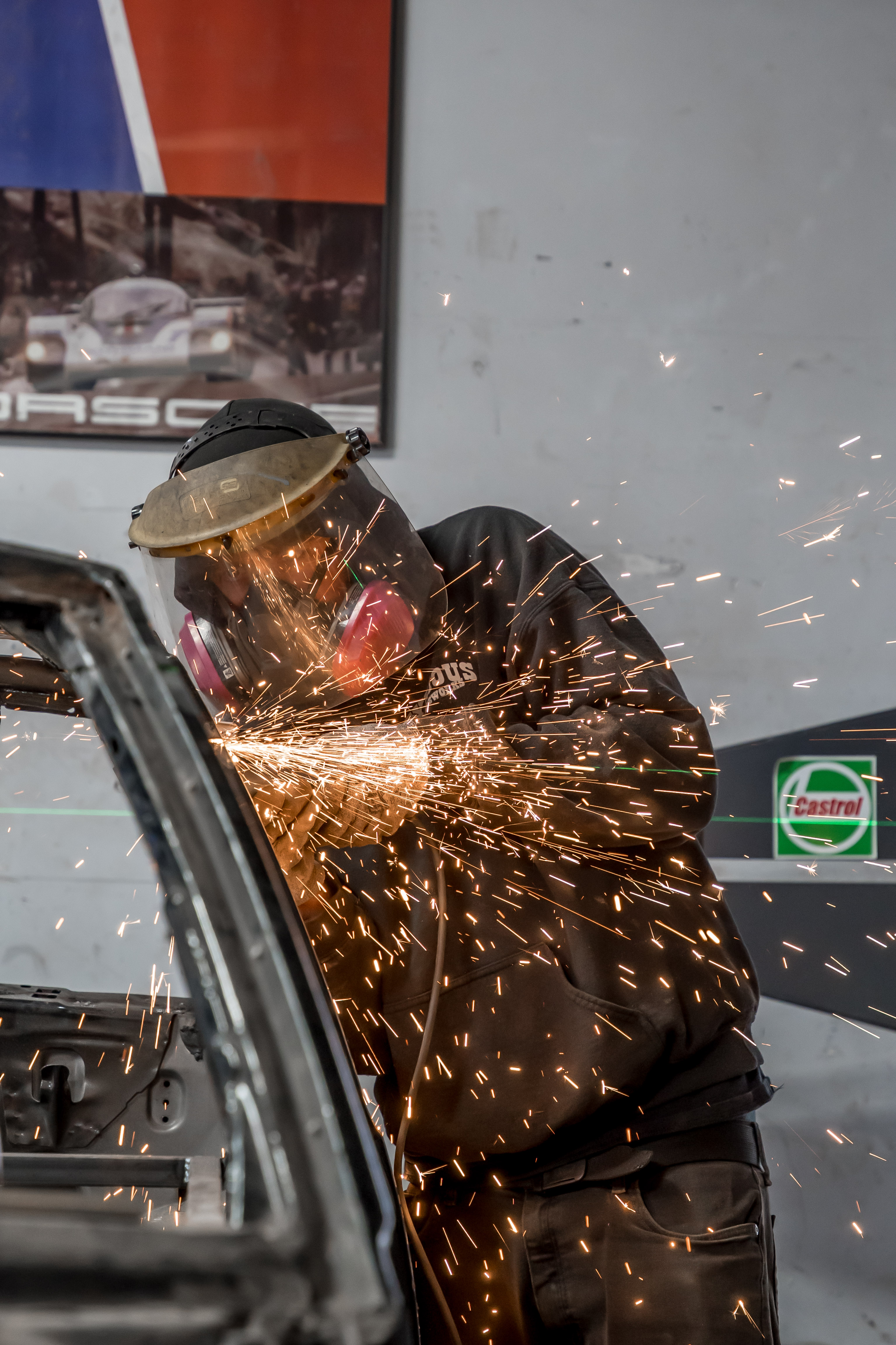 Up close cutting car body with sparks at DTM Fabrication